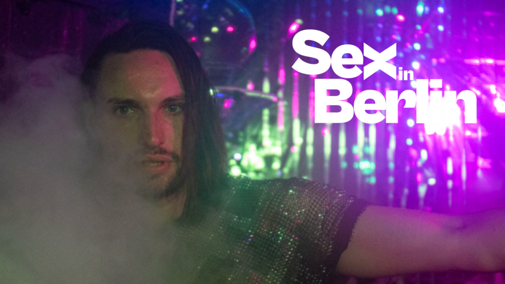 WEBSITE COVER - Sex in Berlin Person with long hair in a smoky nightclub with neon purple-green lights; bold white text reads 'Sex in Berlin' across the right side.